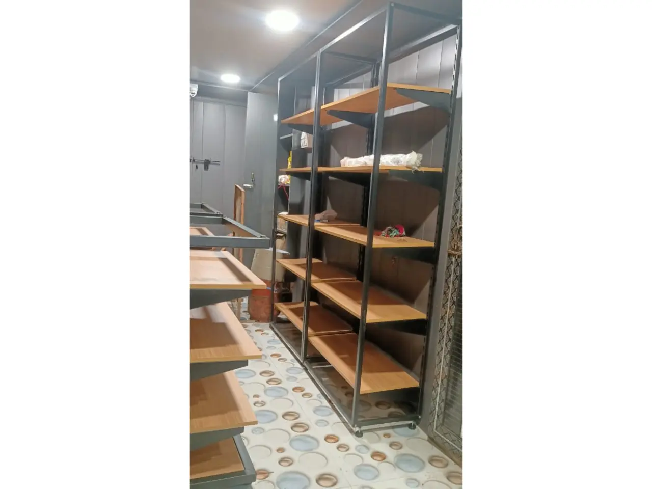 738073795_Garment Display Racks Installation Prayagraj 1.webp